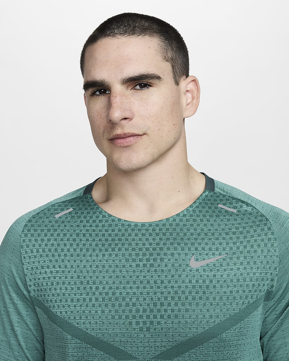 Nike green running top online